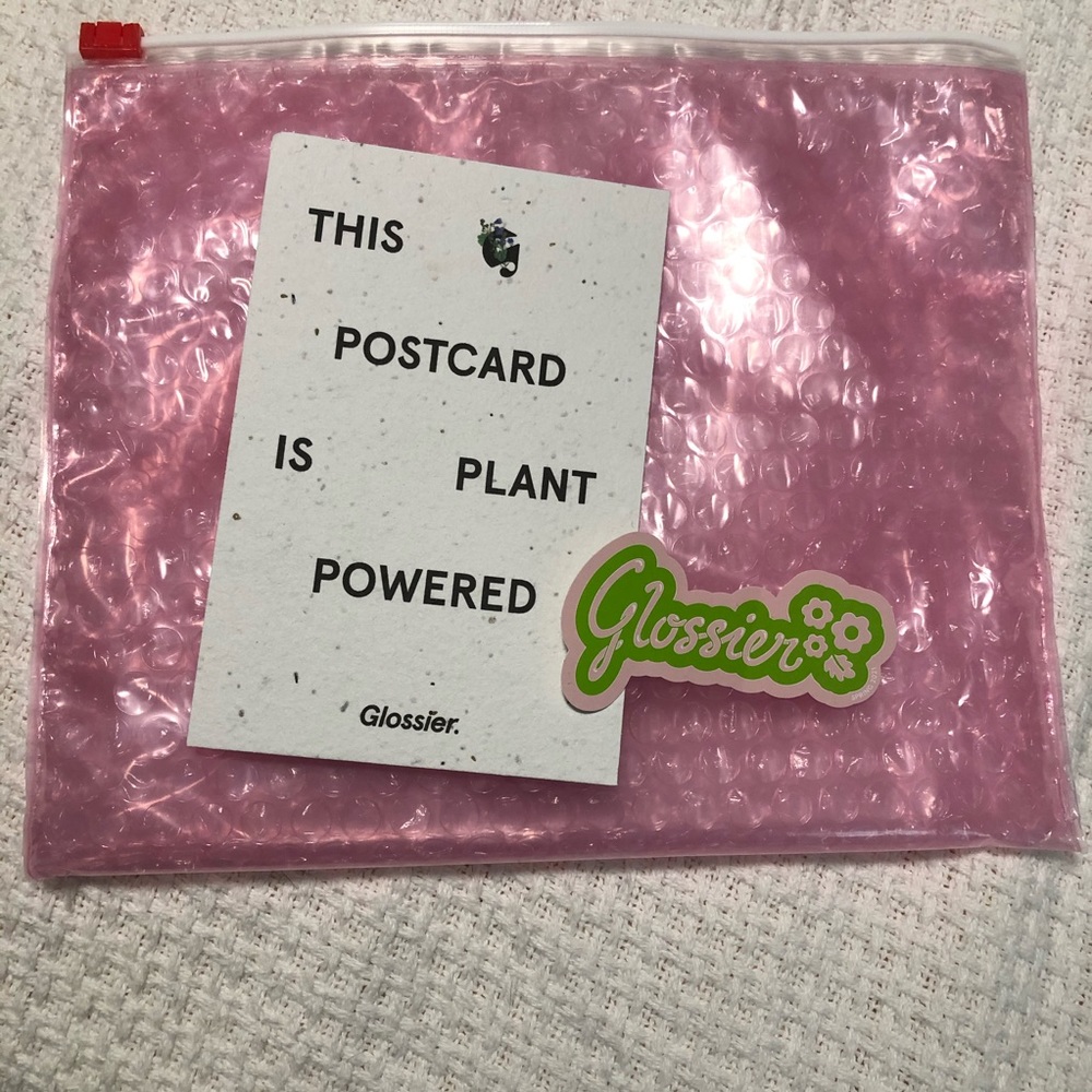 Glossier seed postcard and sticker